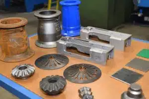 Shot-blasted metal part and Non-shot-blasted metal part